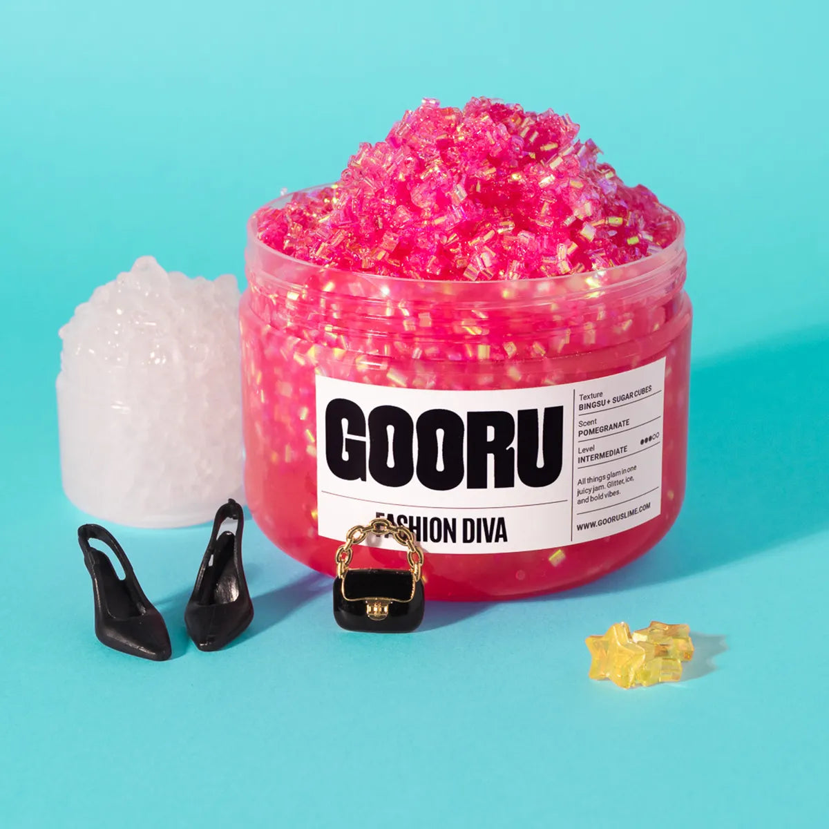 Pink glittery slime in a container with 'GOORU' branding on a blue background