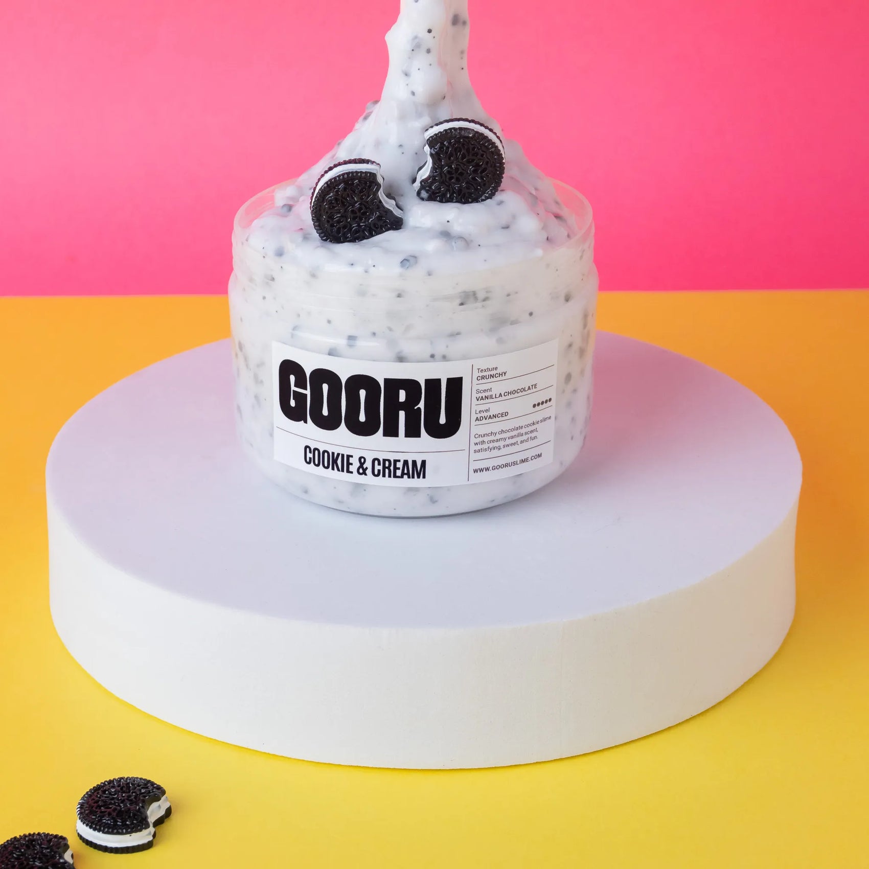 Slime container with 'GOORU' branding on a pink and yellow background