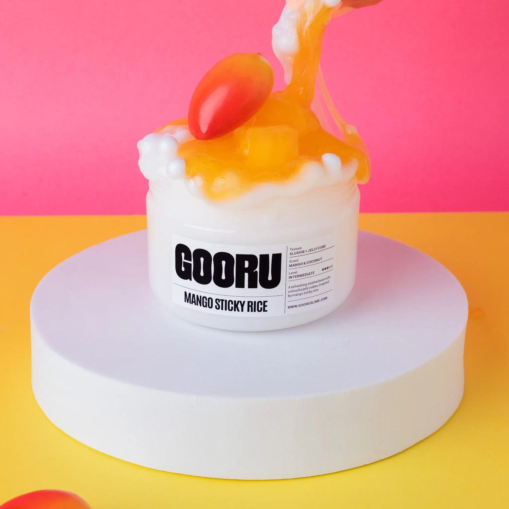 Mango sticky rice slime with GOORU branding on a colorful background