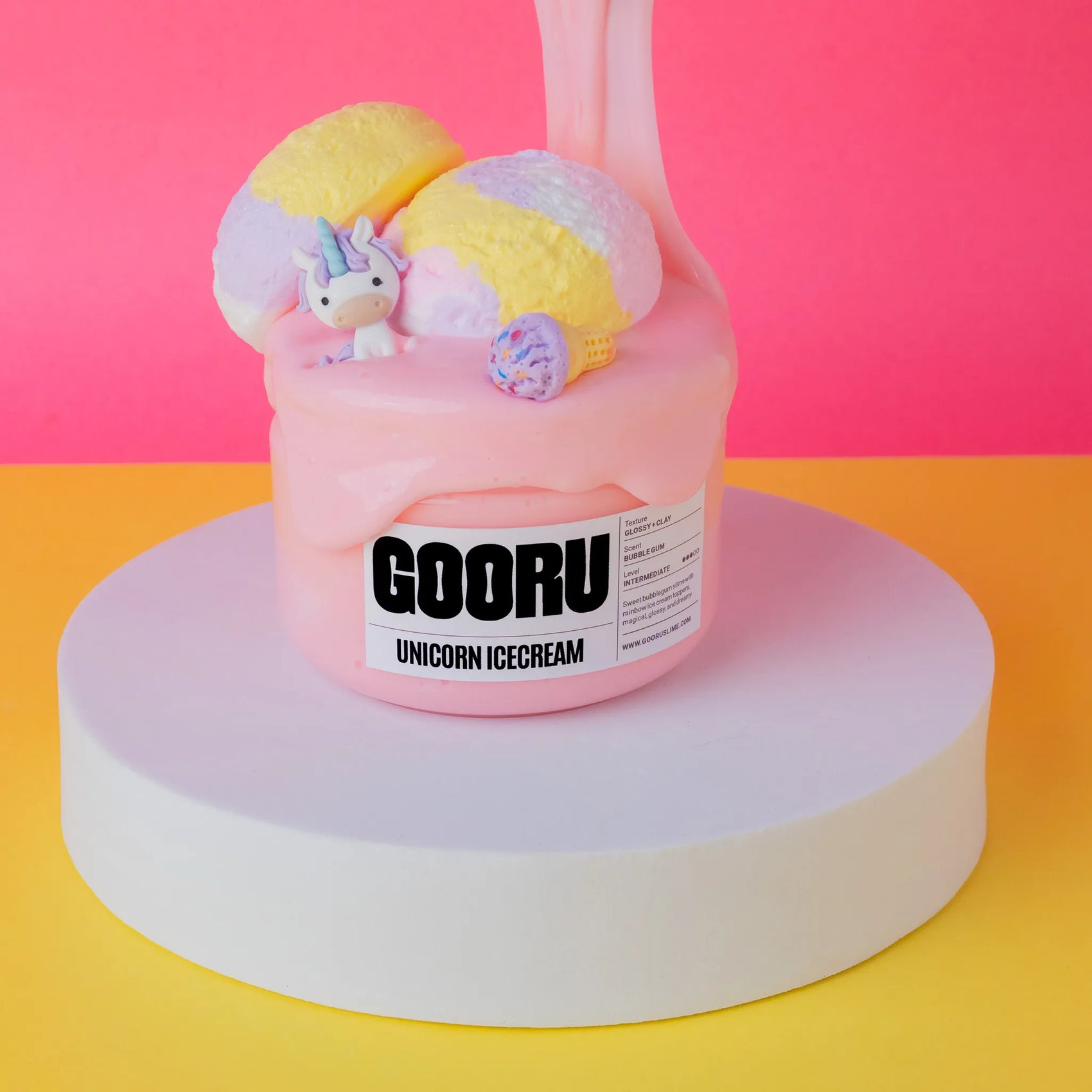 Unicorn-themed slime with 'GOORU' branding on a colorful background