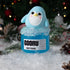 Blue penguin figurine on a jar labeled &