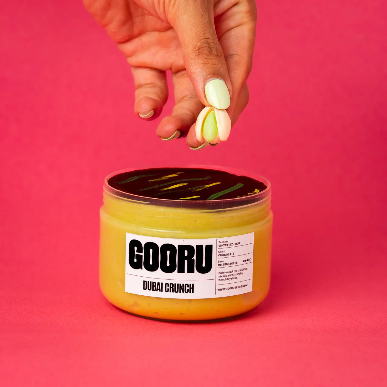 Dubai Crunch by Gooru Slime: crackable chocolate-shell slime with an airy, crunchy base. Handmade in the UAE.