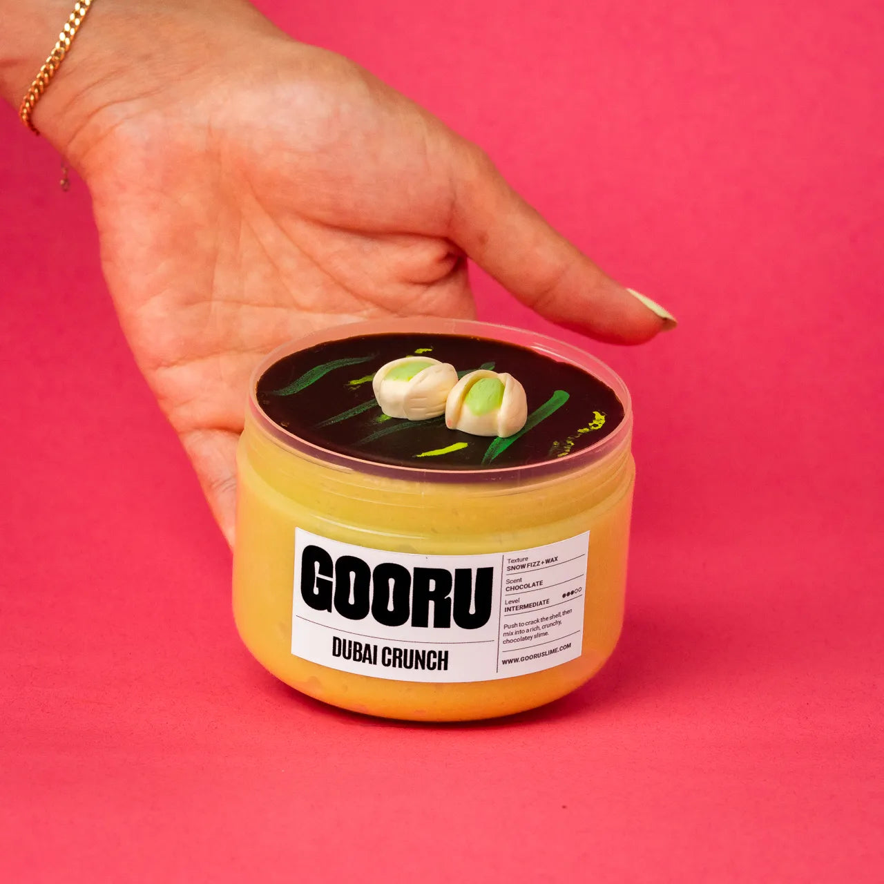 Dubai Crunch by Gooru Slime: crackable chocolate-shell slime with an airy, crunchy base. Handmade in the UAE.