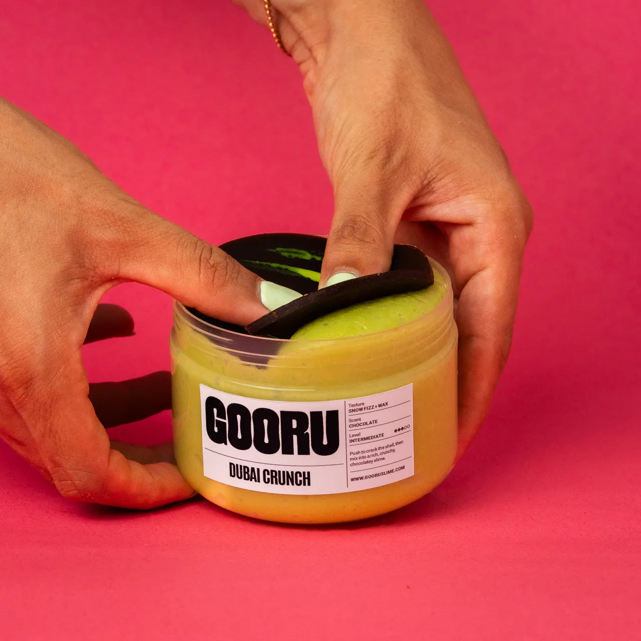 Dubai Crunch by Gooru Slime: crackable chocolate-shell slime with an airy, crunchy base. Handmade in the UAE.