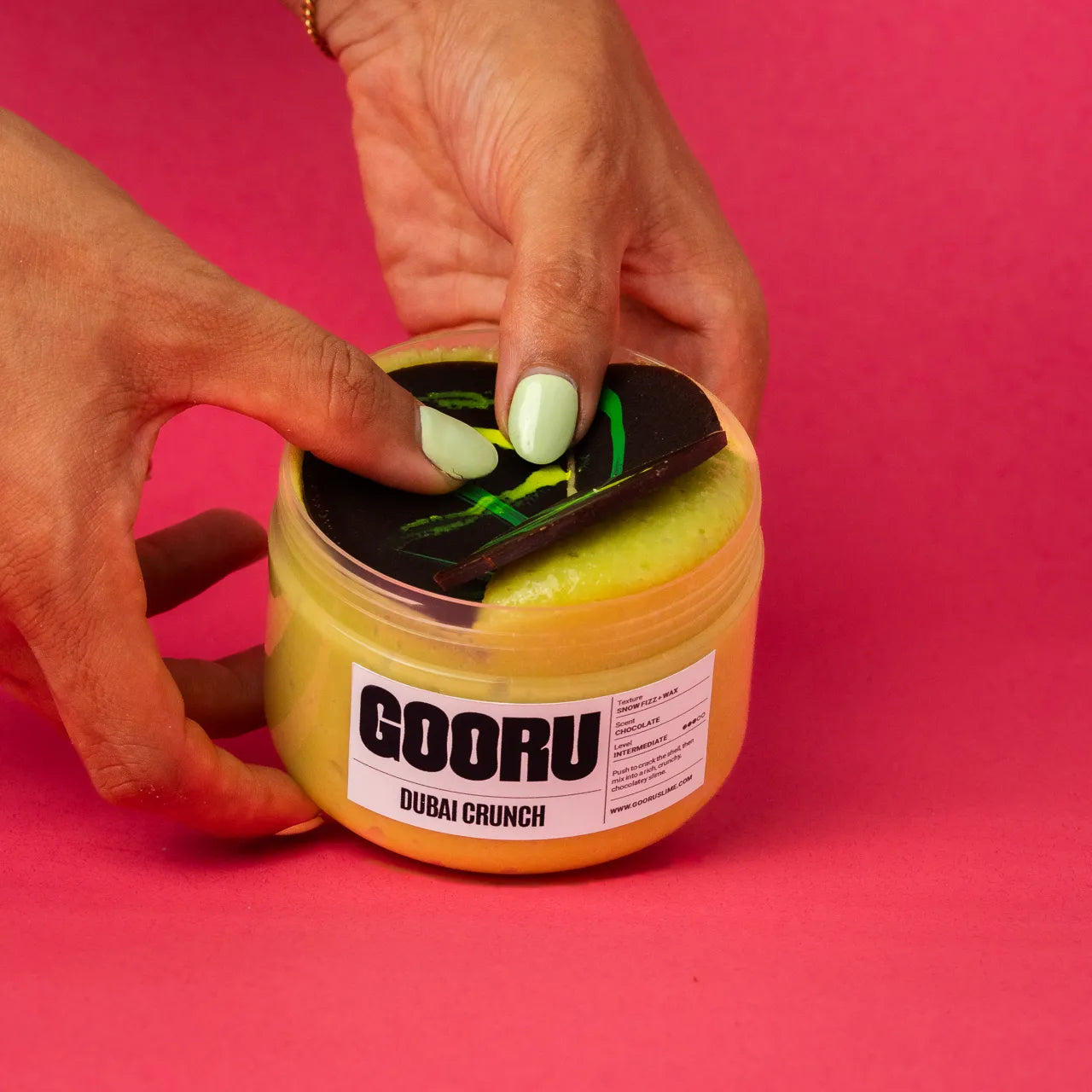 Dubai Crunch by Gooru Slime: crackable chocolate-shell slime with an airy, crunchy base. Handmade in the UAE.