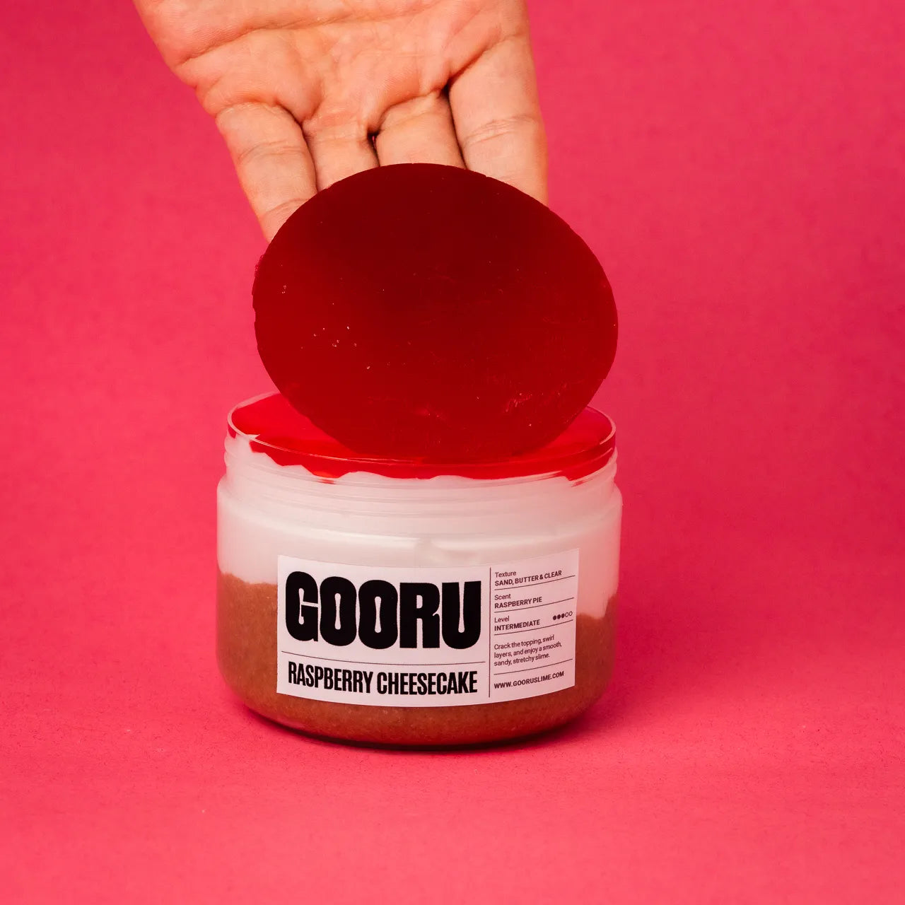 Raspberry Cheesecake by Gooru Slime: crackable multi-layer slime inspired by a classic dessert. Handmade in the UAE.