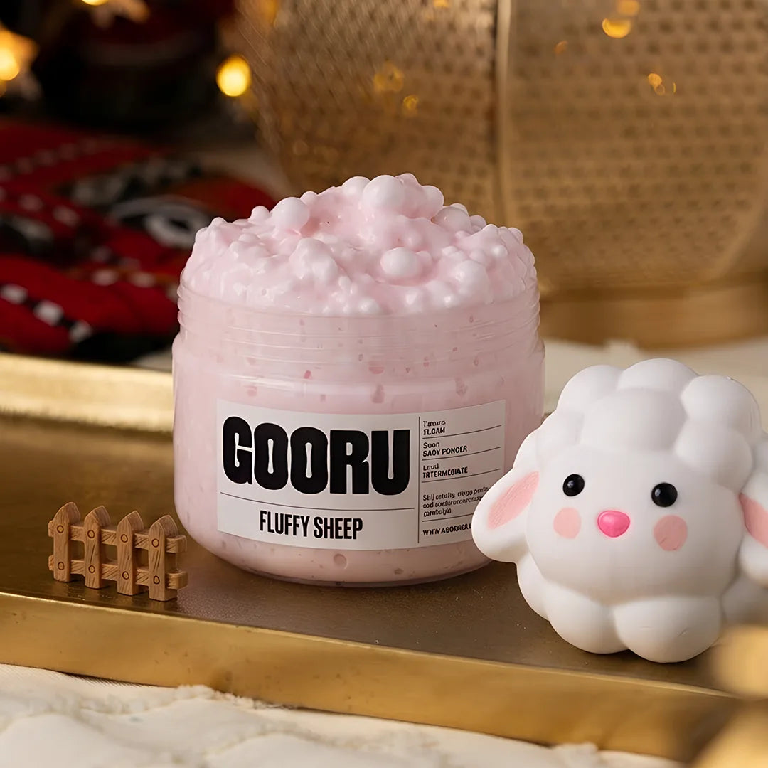 Fluffy Sheep by Gooru Slime: light floam slime with a sheep charm and baby powder scent. Handmade in the UAE.