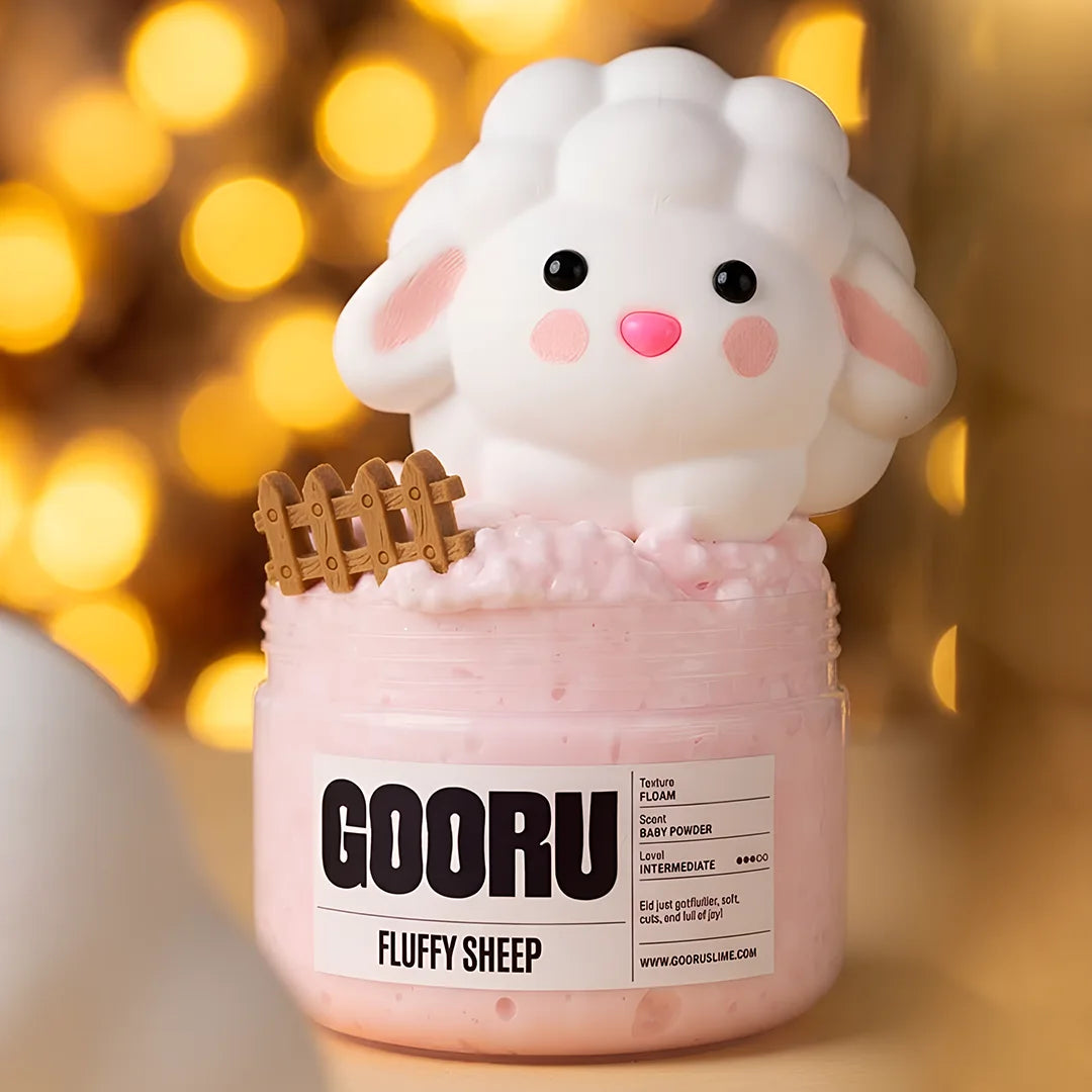 Fluffy Sheep by Gooru Slime: light floam slime with a sheep charm and baby powder scent. Handmade in the UAE.