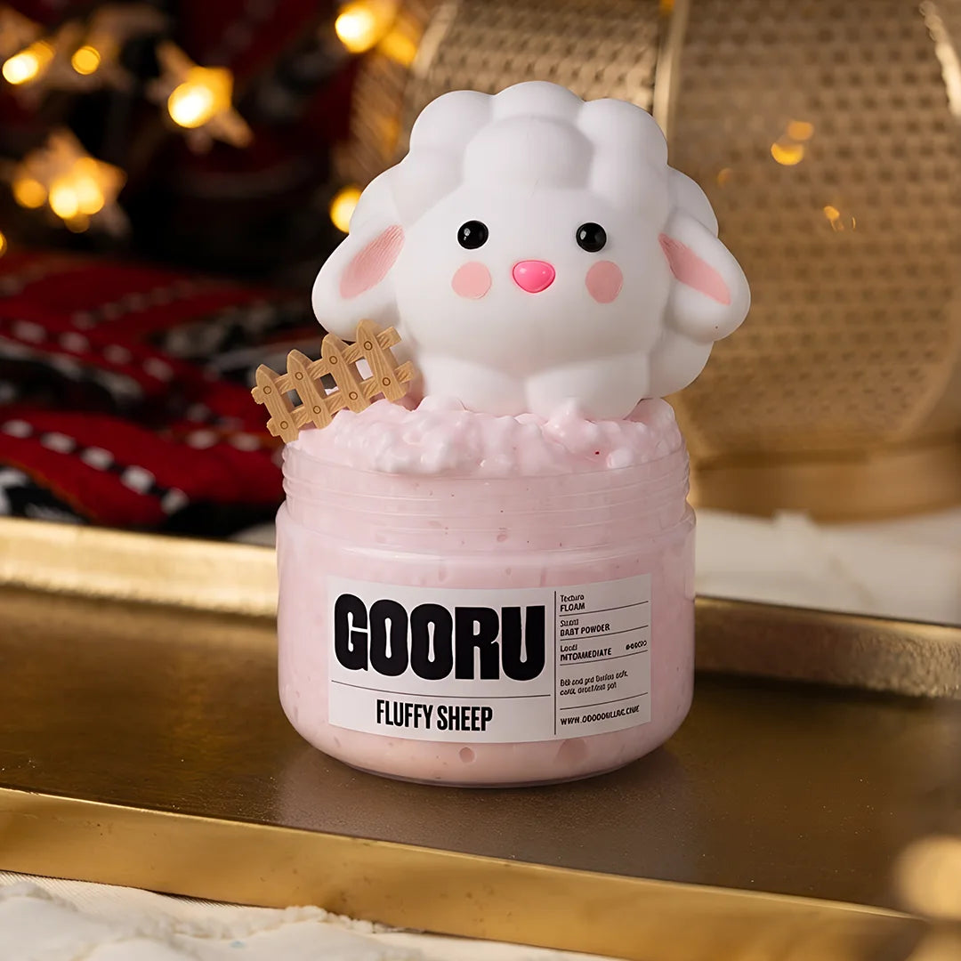Fluffy Sheep by Gooru Slime: light floam slime with a sheep charm and baby powder scent. Handmade in the UAE.
