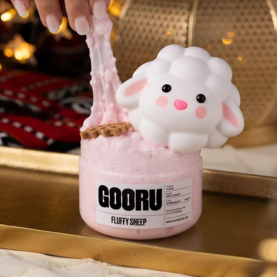 Fluffy Sheep by Gooru Slime: light floam slime with a sheep charm and baby powder scent. Handmade in the UAE.